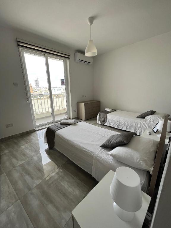 Postel nebo postele na pokoji v ubytování F8 Room 3, Private Room two single beds shared bathroom in shared Flat