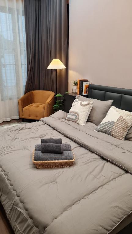 Postel nebo postele na pokoji v ubytování บ้านเซฟโซน