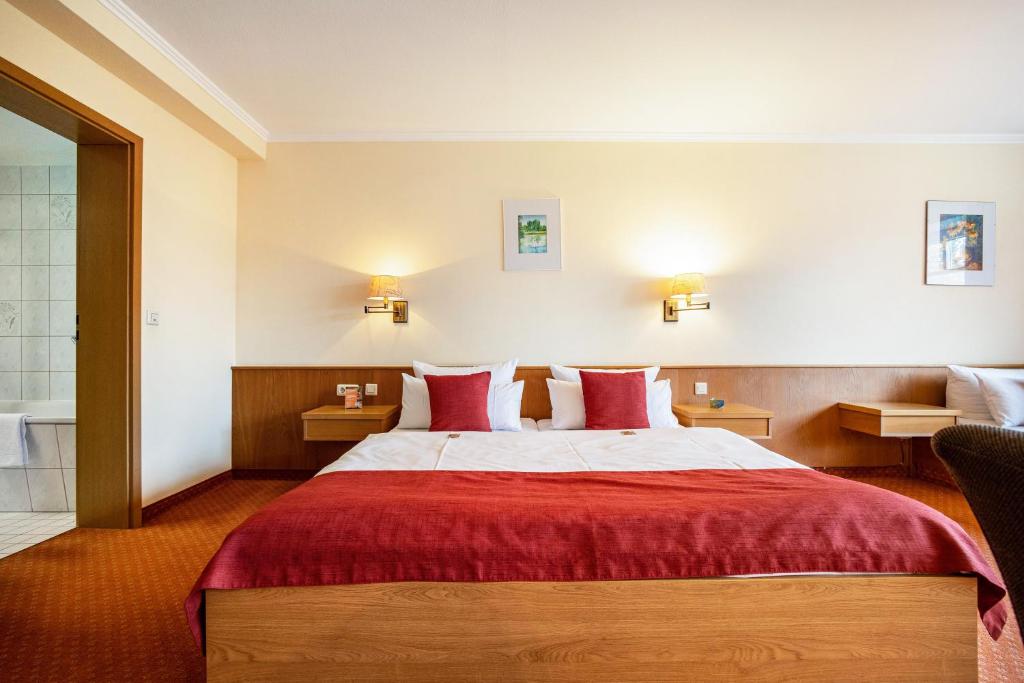 Una cama o camas en una habitación de Landschloss Ernestgrün Apartment411