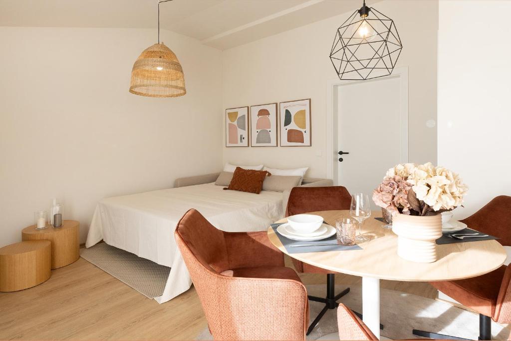 Postel nebo postele na pokoji v ubytování Kolibri Apartment