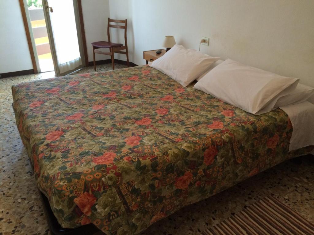 Postel nebo postele na pokoji v ubytování Hotel Aurora