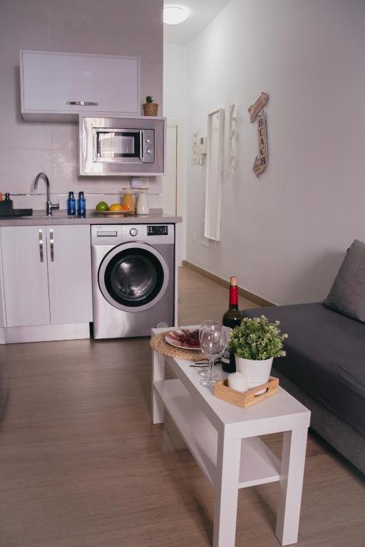 Kuchyňa alebo kuchynka v ubytovaní Picasso Premium Apartment