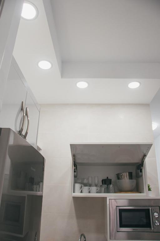 Kuchyňa alebo kuchynka v ubytovaní Picasso Premium Apartment