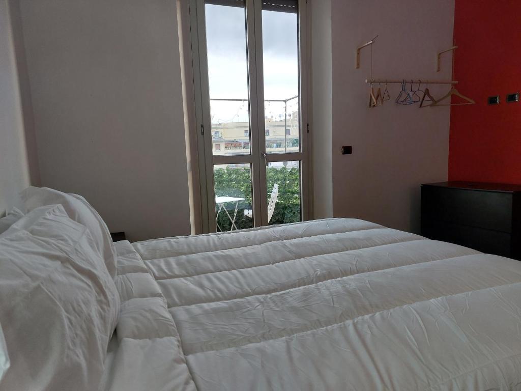 Letto o letti in una camera di Your Happy Home
