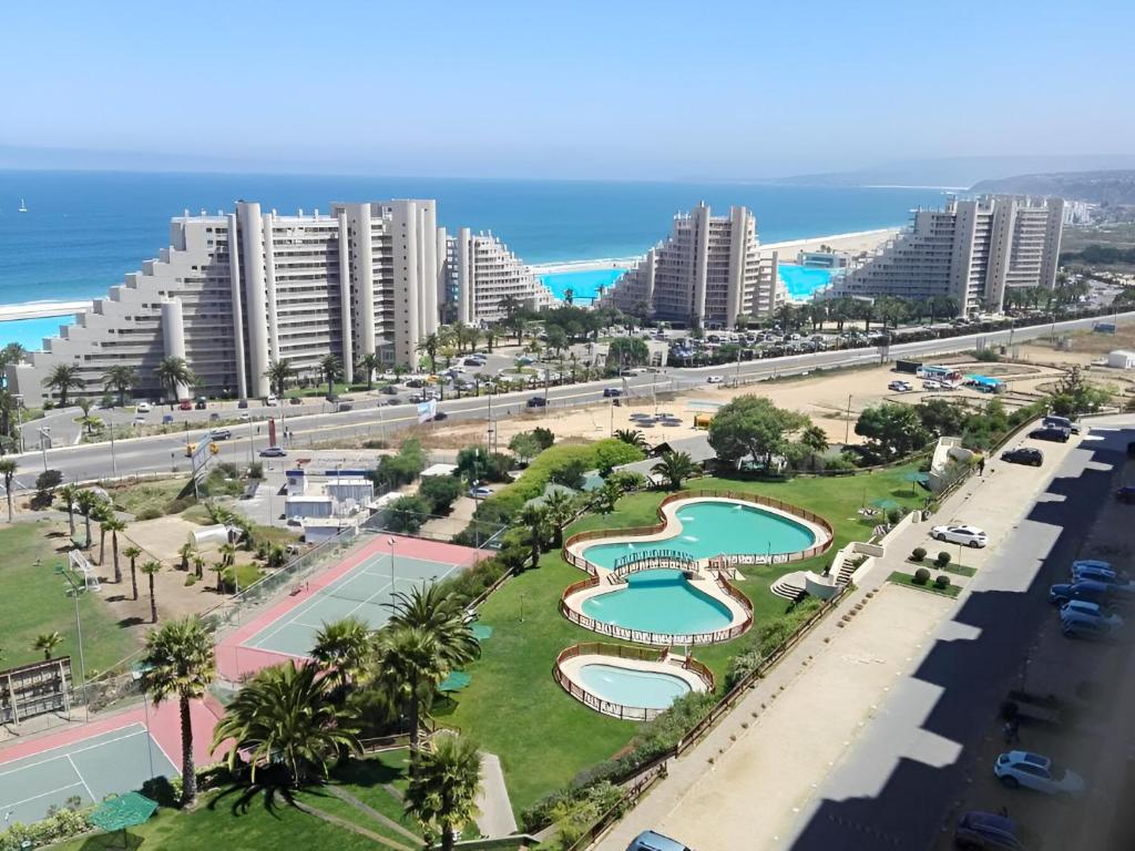 an aerial view of a resort with a pool at Altos de San Alfonso in Algarrobo