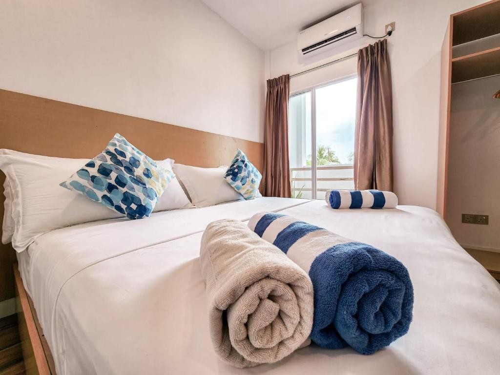 Postel nebo postele na pokoji v ubytování Raalhu Fonu Maldives