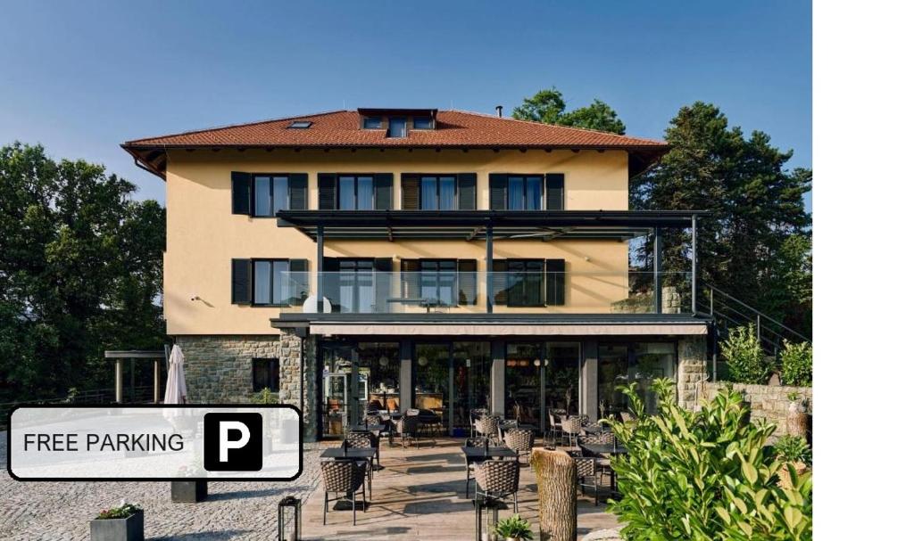 a building with a free parking sign in front of it at Hotel Republika in Zagreb