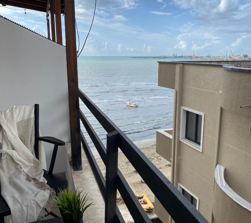 a balcony view of the ocean from a condo at Hygge Apartment in Durrës