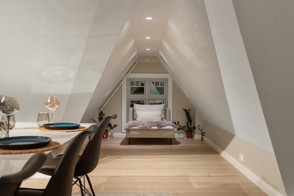 En eller flere senger på et rom på ARCTIC HOMES - Premium Retreat