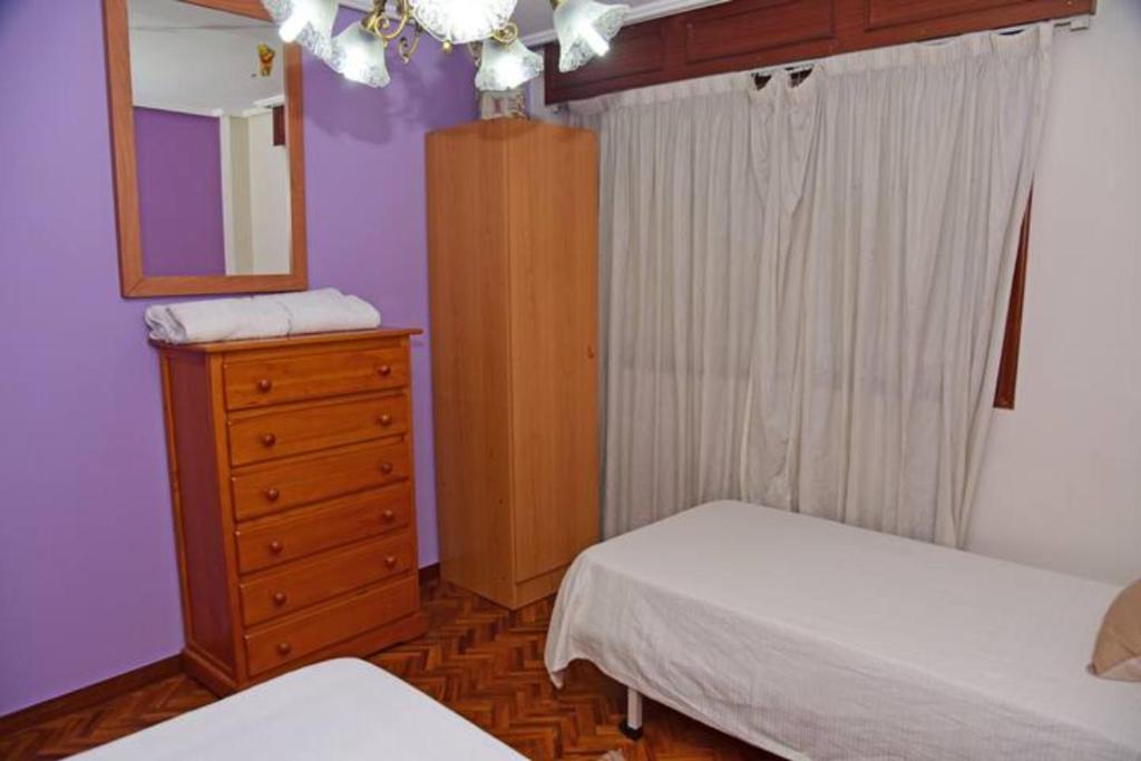 Postel nebo postele na pokoji v ubytování Piso Ourense Bonito y Termal