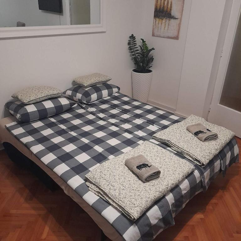 Postel nebo postele na pokoji v ubytování Apartman Mika **Centar **