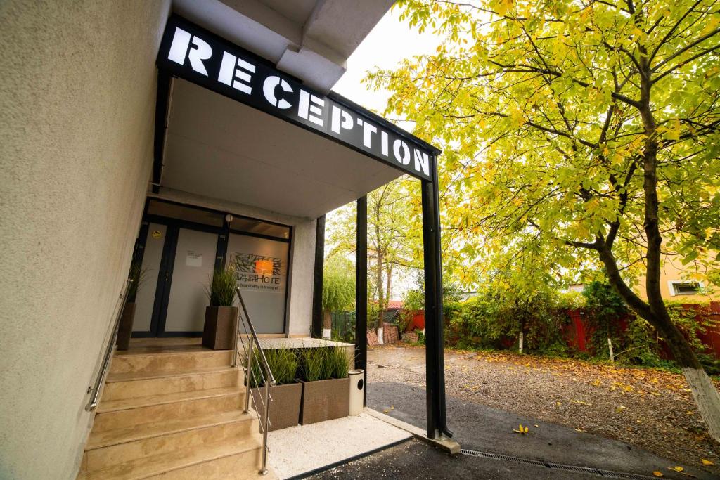 a building with a sign that reads regeneration at Bucharest Airport Accomodation in Otopeni