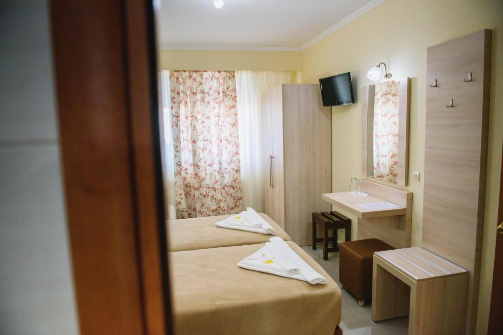 Posteľ alebo postele v izbe v ubytovaní Santa Rosa Hotel & Beach