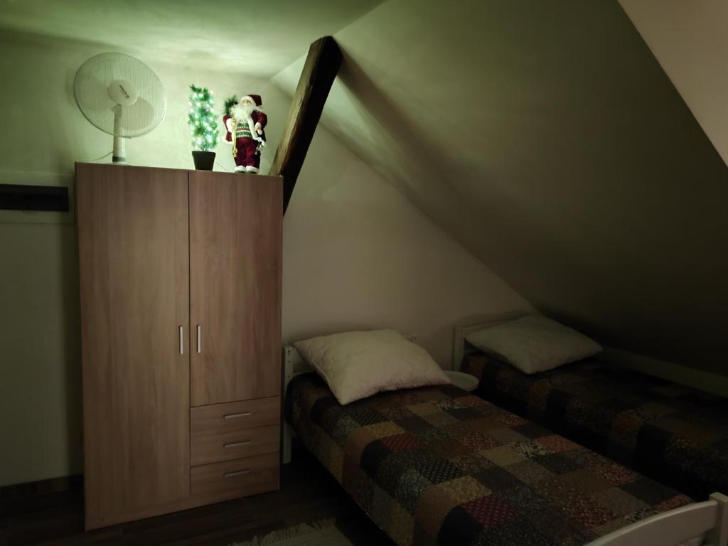 Postel nebo postele na pokoji v ubytování Kralovak