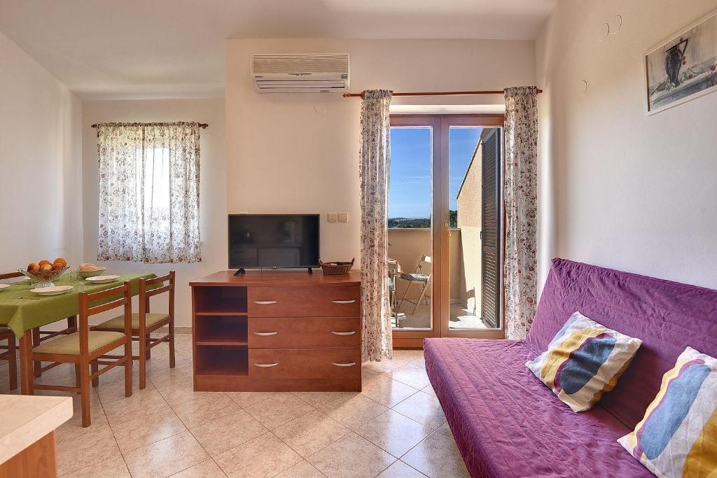Posezení v ubytování Apartment Malvazija