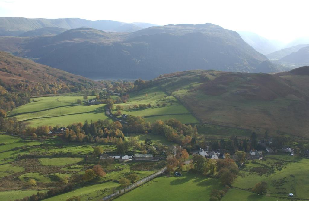 an aerial view of a green valley with mountains at Royal Hotel in Dockray