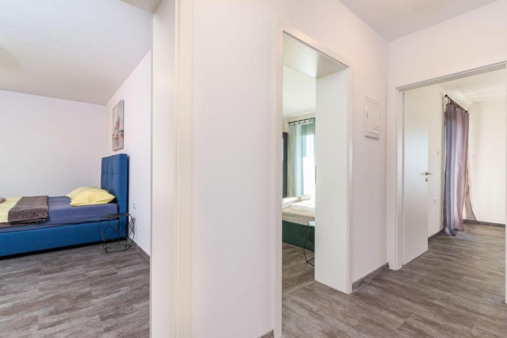 Łóżko lub łóżka w pokoju w obiekcie Luxuriöse Villa mit privatem Pool und Sonnenterrasse