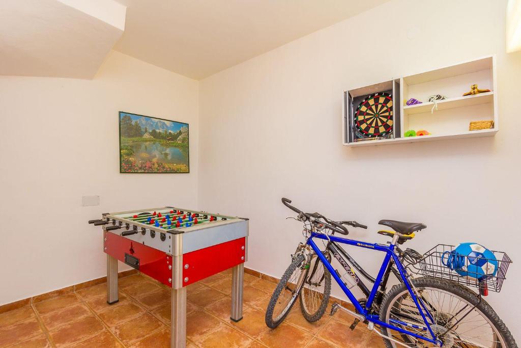 Fotografie z fotogalerie ubytování Ferienwohnung mit großem Pool, Klima, WLAN, Tischtennis v destinaci Valtura