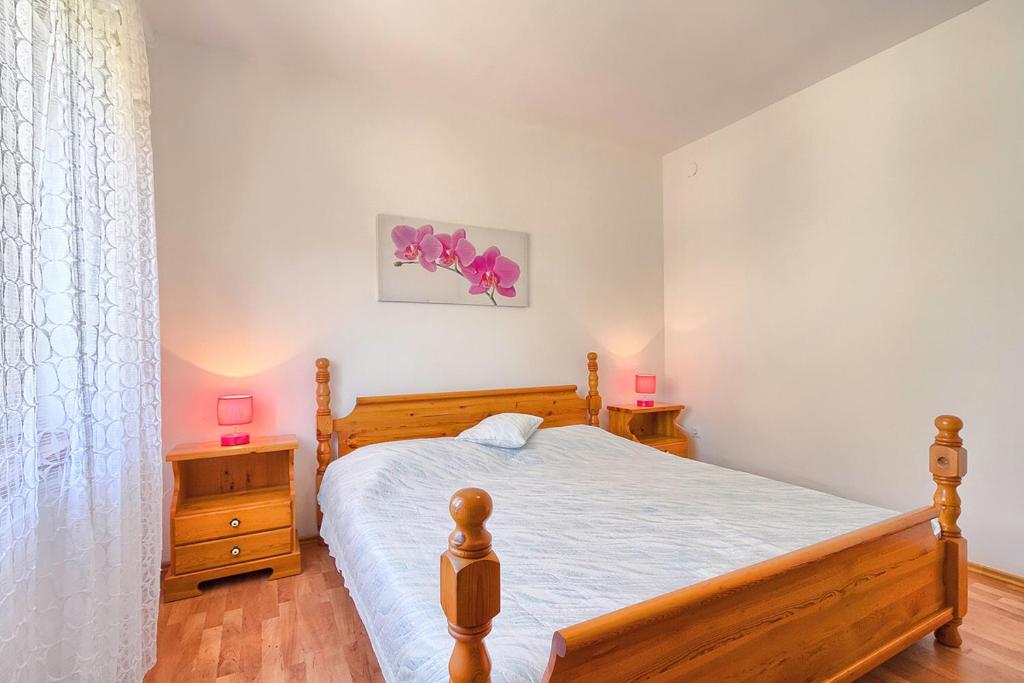 Postel nebo postele na pokoji v ubytování Im Jahr 2014 renoviertes Ferienhaus 400 Meter zum Strand