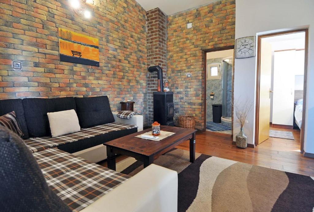 Część wypoczynkowa w obiekcie Herrliches Ferienhaus mit Klima, WLAN, Terrasse und Grillbereich