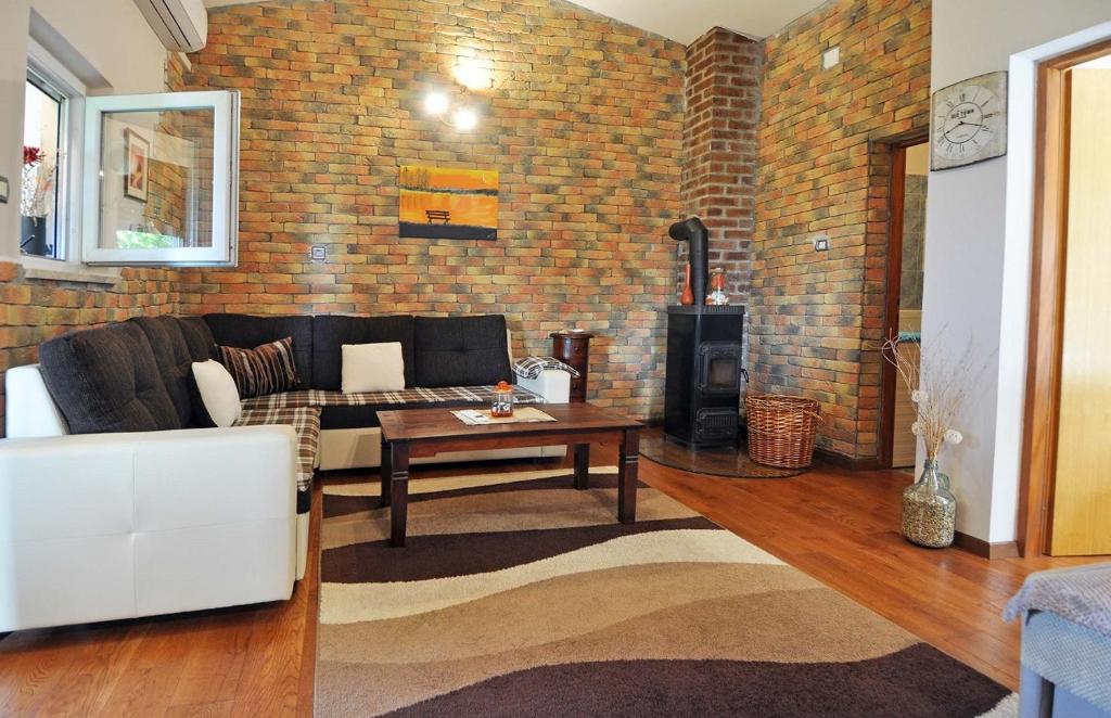 Część wypoczynkowa w obiekcie Herrliches Ferienhaus mit Klima, WLAN, Terrasse und Grillbereich