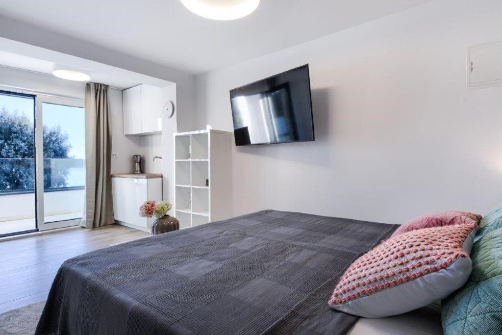 Postel nebo postele na pokoji v ubytování Exklusive Villa mit privatem Pool 50 Meter zum Strand