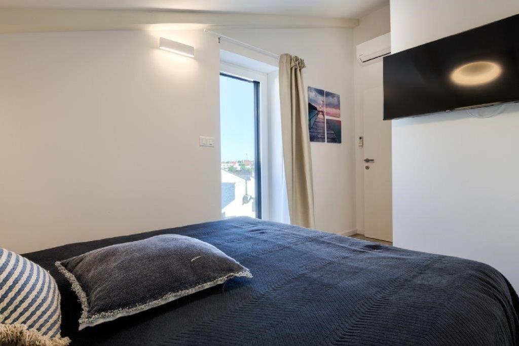 Postel nebo postele na pokoji v ubytování Exklusive Villa mit privatem Pool 50 Meter zum Strand