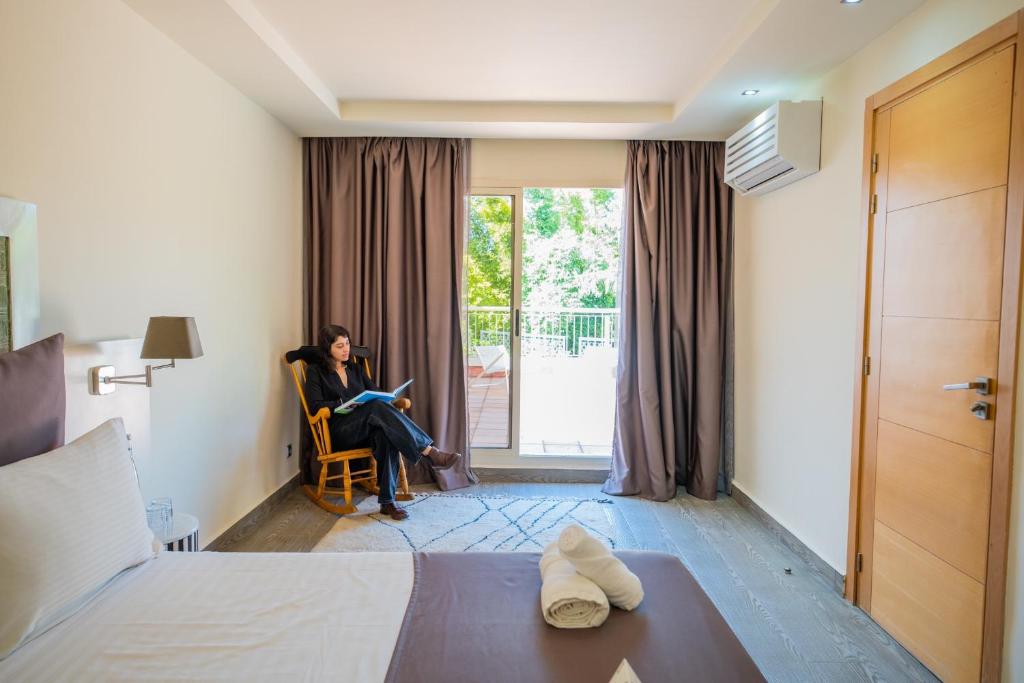Postel nebo postele na pokoji v ubytování MORO Marrakech Boutique Hôtel
