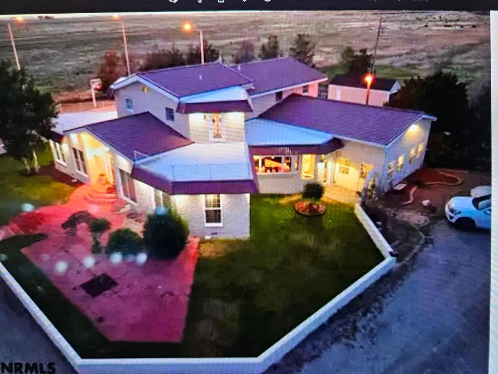 an aerial view of a house with a yard at River View Ranch 