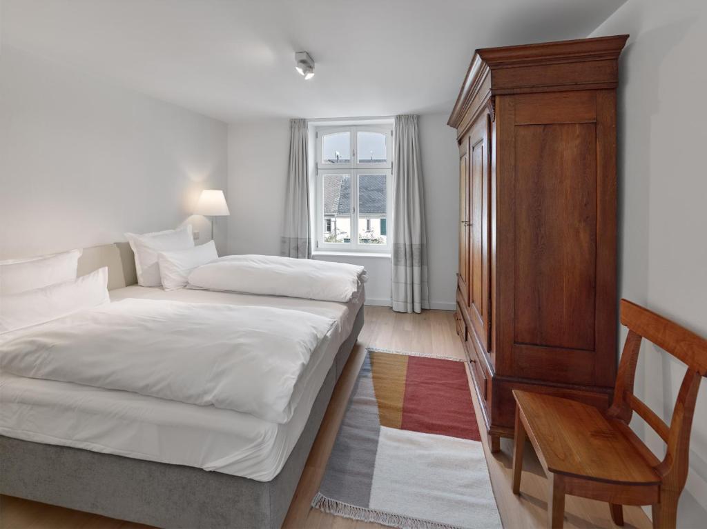 Postel nebo postele na pokoji v ubytování Gästehaus Cantzheim