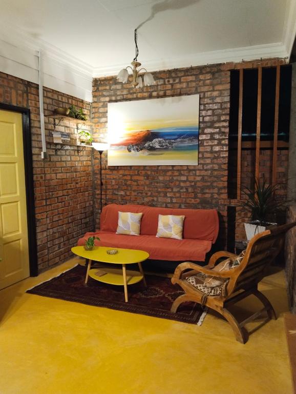 Posezení v ubytování Pondok Keladi Langkawi Guesthouse