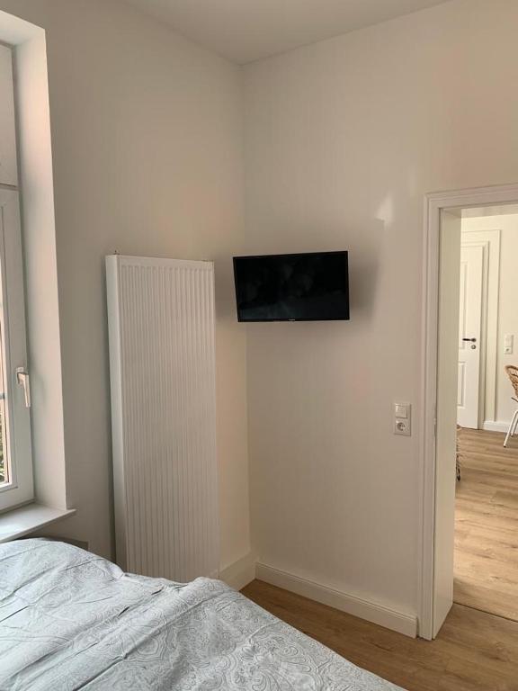 Postel nebo postele na pokoji v ubytování NEU Küstenliebe Friesland