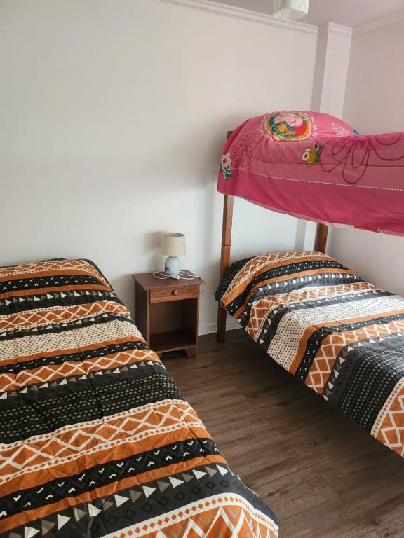 Postel nebo postele na pokoji v ubytování Quebrada de la Candelaria II