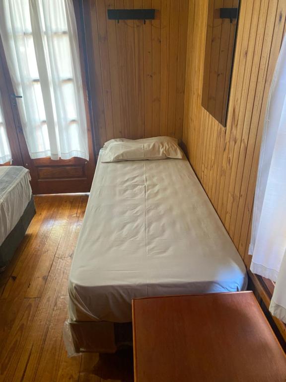 Postel nebo postele na pokoji v ubytování El Pindo Iguazu