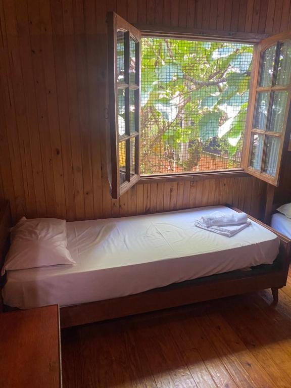 Postel nebo postele na pokoji v ubytování El Pindo Iguazu