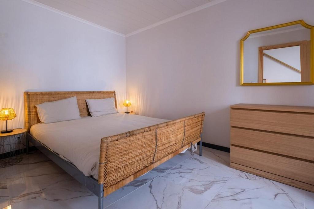 Postel nebo postele na pokoji v ubytování Casa da Antonieta