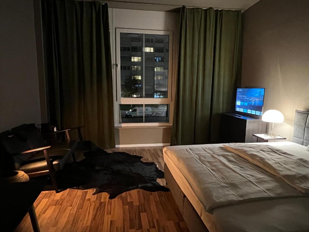 Postel nebo postele na pokoji v ubytování N8 ROOMS - by Leipzig Suites
