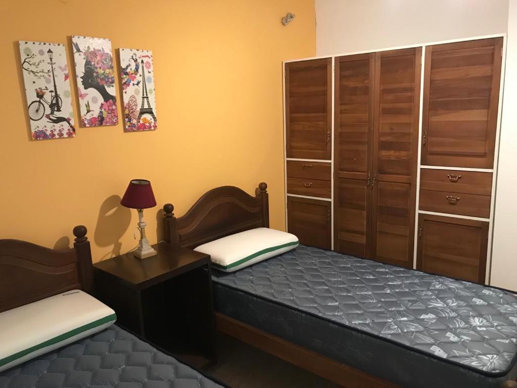 Ένα ή περισσότερα κρεβάτια σε δωμάτιο στο BUENOS AIRES 2 - MICA