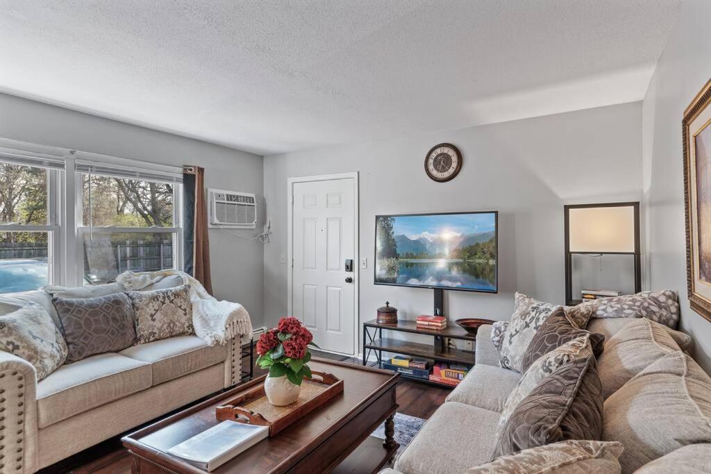 a living room with a couch and a table at Tranquil 2BR Apt Mpls - 8073 Apt 1 in Spring Lake Park
