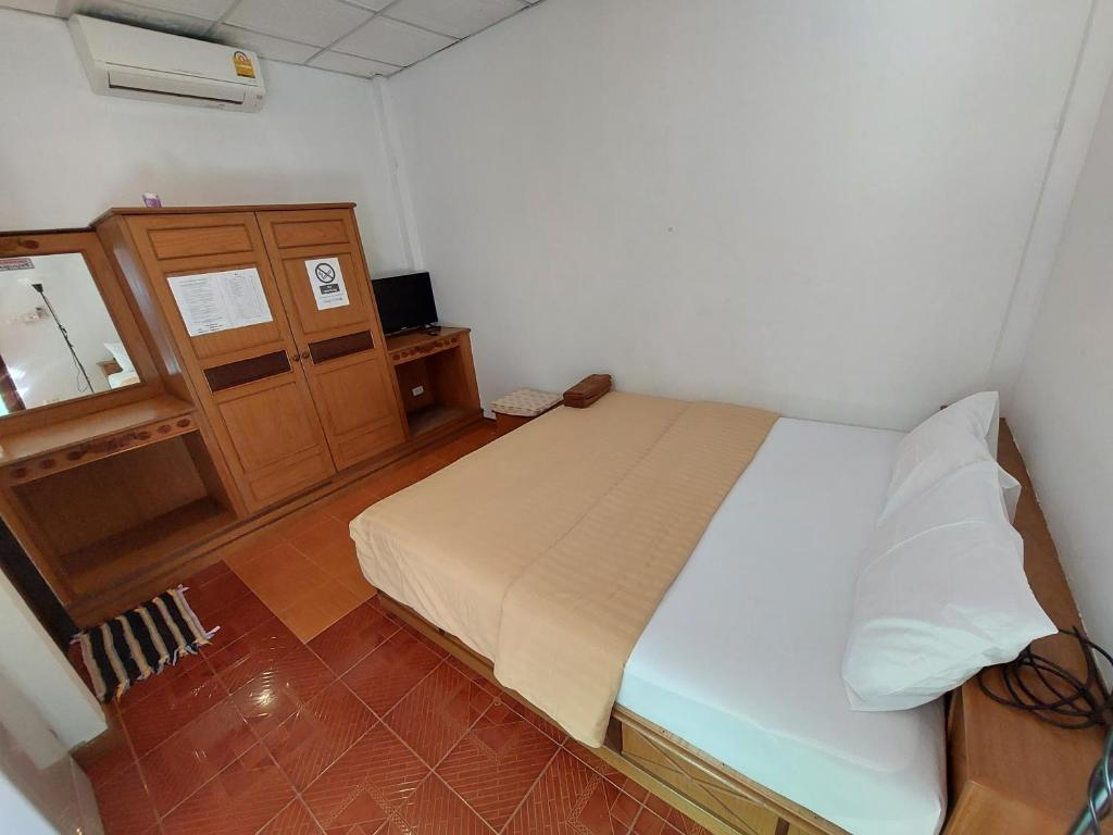 Postel nebo postele na pokoji v ubytování Fullmoon House Samui