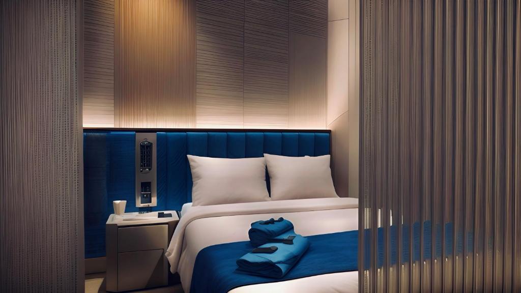 Postel nebo postele na pokoji v ubytování Qube Hotel by 98hospitality