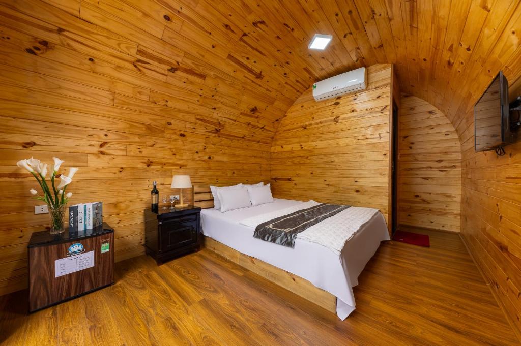 Postel nebo postele na pokoji v ubytování Green Homestay
