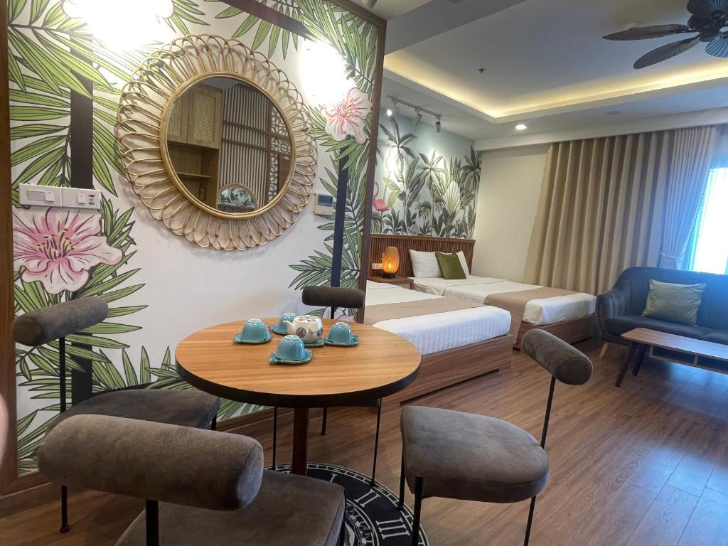 Postel nebo postele na pokoji v ubytování FLC Sea Tower - Căn Hộ Biển Quy Nhơn