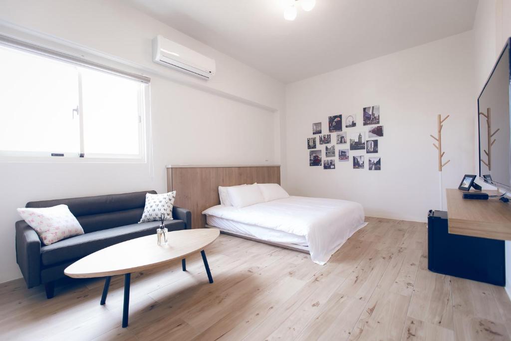 Postel nebo postele na pokoji v ubytování snoozinn