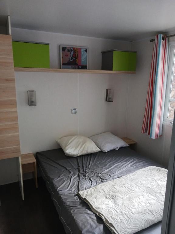 Postel nebo postele na pokoji v ubytování Sun Sea camping le Bosc