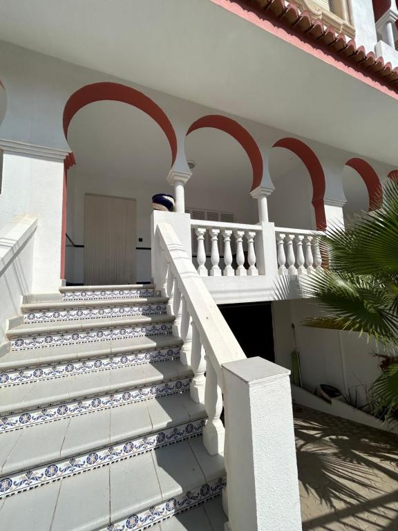 Balkonas arba terasa apgyvendinimo įstaigoje Casa en la costa Marítima