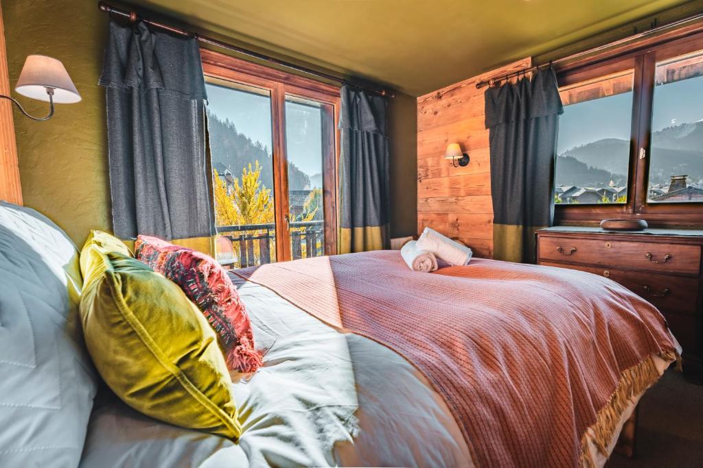 Postel nebo postele na pokoji v ubytování The Fat Fox Lodge, Morzine