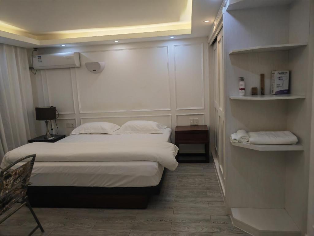 Postel nebo postele na pokoji v ubytování LATA HOTEL
