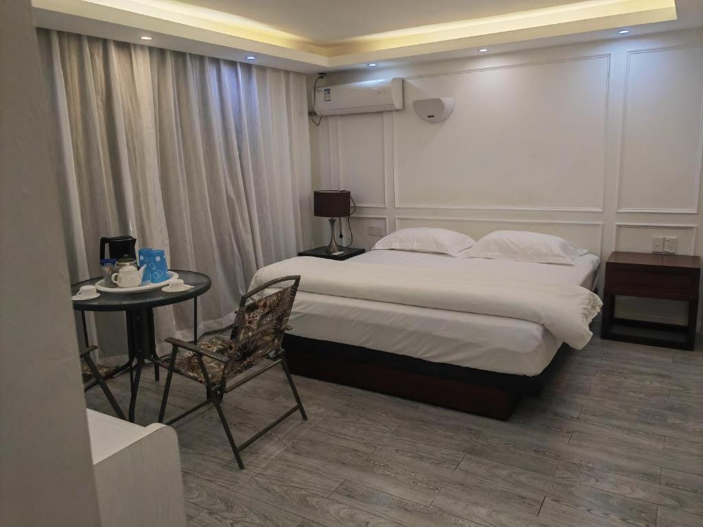 Postel nebo postele na pokoji v ubytování LATA HOTEL