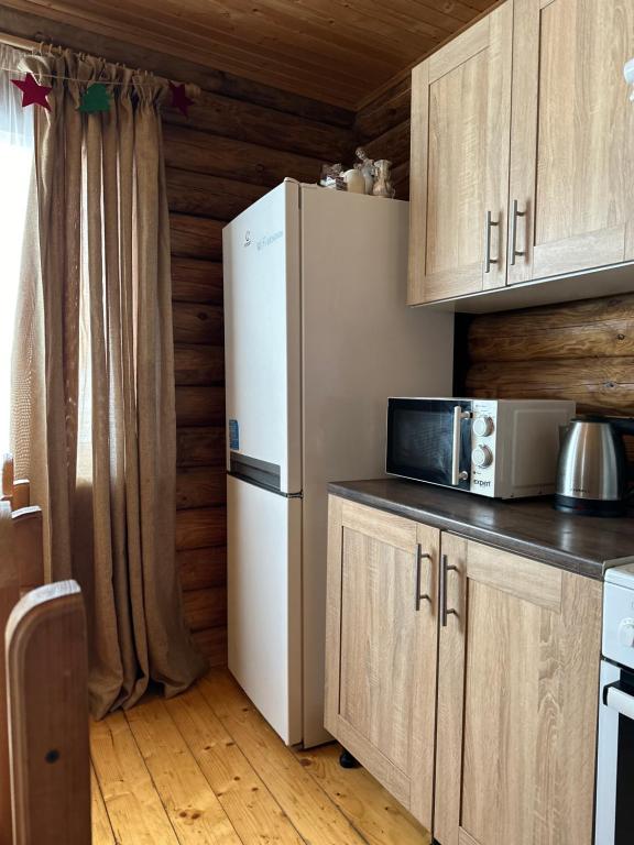 Kuchyň nebo kuchyňský kout v ubytování Cottage Marko